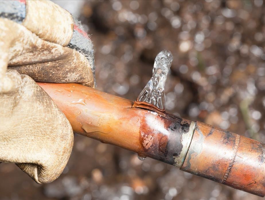 Pinhole leak on copper pipe.